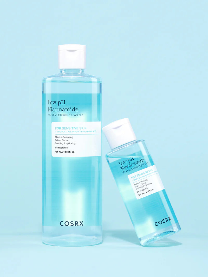 COSRX Low pH Niacinamide Micellar Cleansing Water bottles on blue background