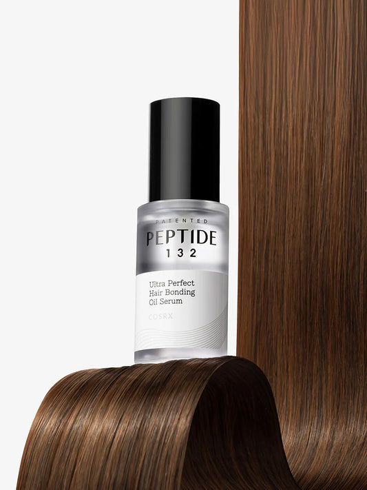 COSRX PEPTIDE-132 Bonding Oil Serum bottle with glossy hair – peptide hair oil