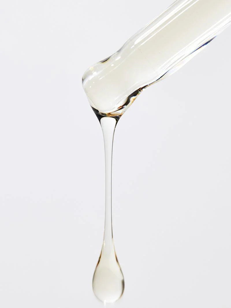 COSRX Full Fit Propolis Light Ampoule honey-like serum texture dripping from dropper