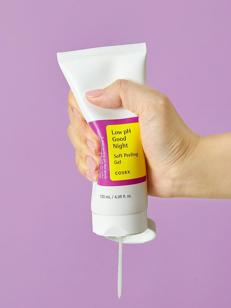 Hand squeezing COSRX Low pH Goodnight Soft Peeling Gel