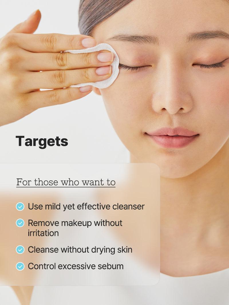 Woman removing makeup with COSRX Low pH Niacinamide Micellar Cleansing Water and cotton pad
