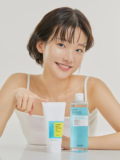 Woman with COSRX Low pH Micellar Cleansing Water and Good Morning Gel Cleanser – double cleansing
