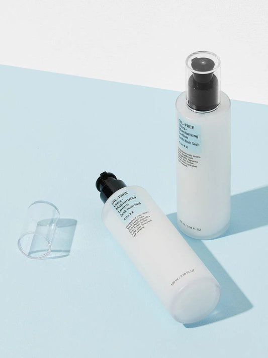 COSRX Oil-Free Ultra-Moisturizing Lotion with Birch Sap on blue background